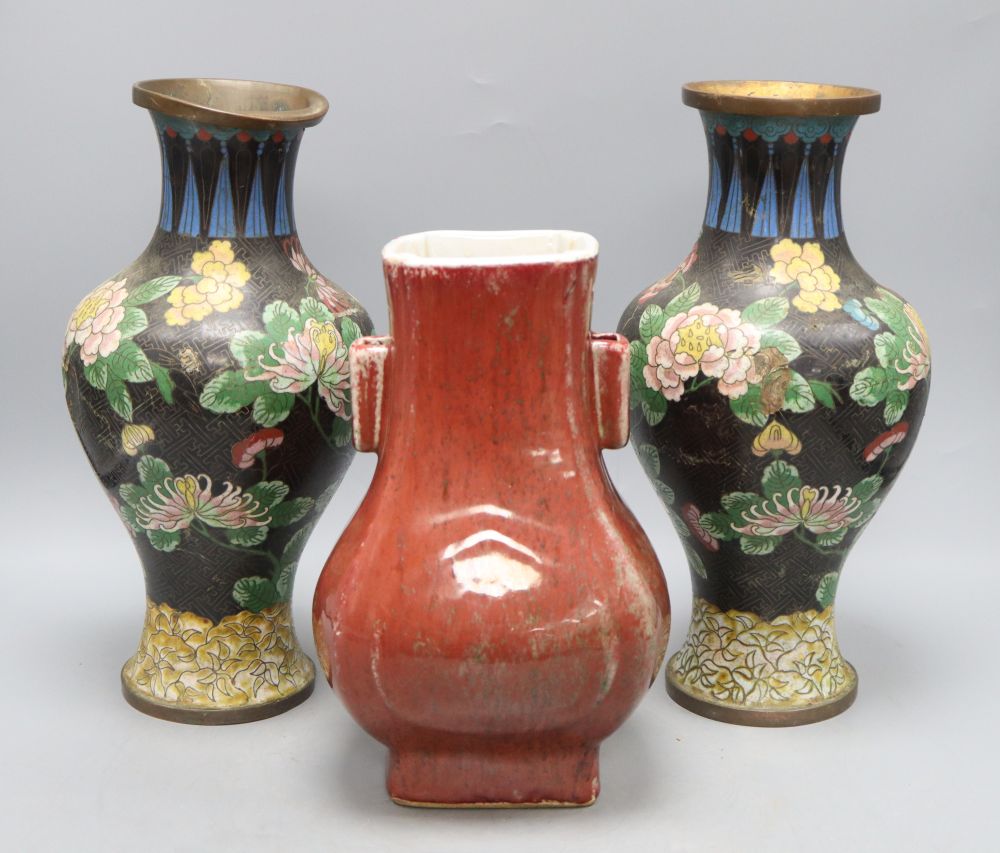 A pair of cloisonne vases, height 34cm and a sang de boeuf vase